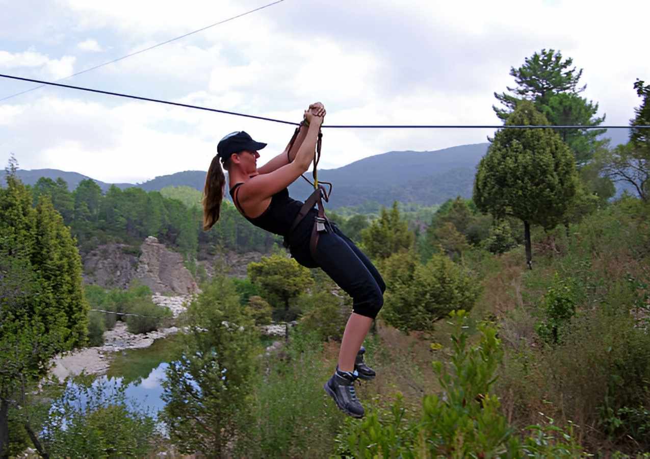 a young woman having fun with zipline