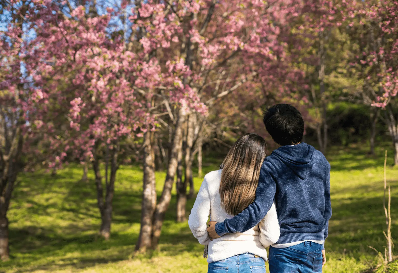 Springtime strolling in the park at Poconos with a young couple